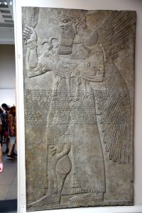 Wall Reliefs: Assyrian Apkallus from Nimrud holding a Goat and Deer ...